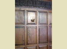 Raised butterfly on Oak panelling